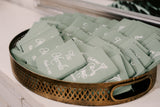 Custom neoprene koozies on a tray