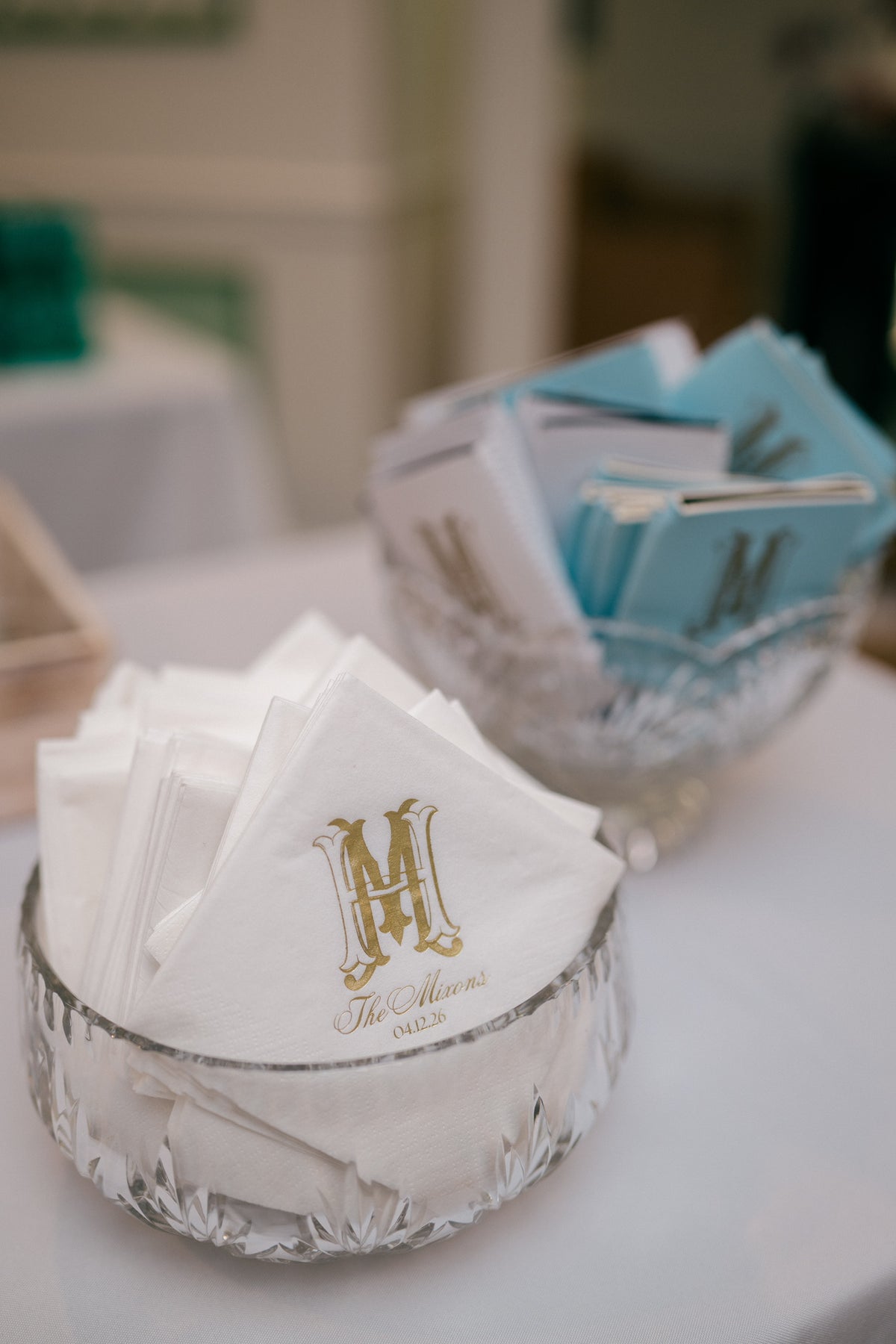 Custom cocktail napkins in a glass holder