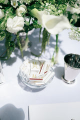 Custom matchboxes in a glass bowl
