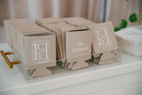 Custom neoprene koozies stacked for guests